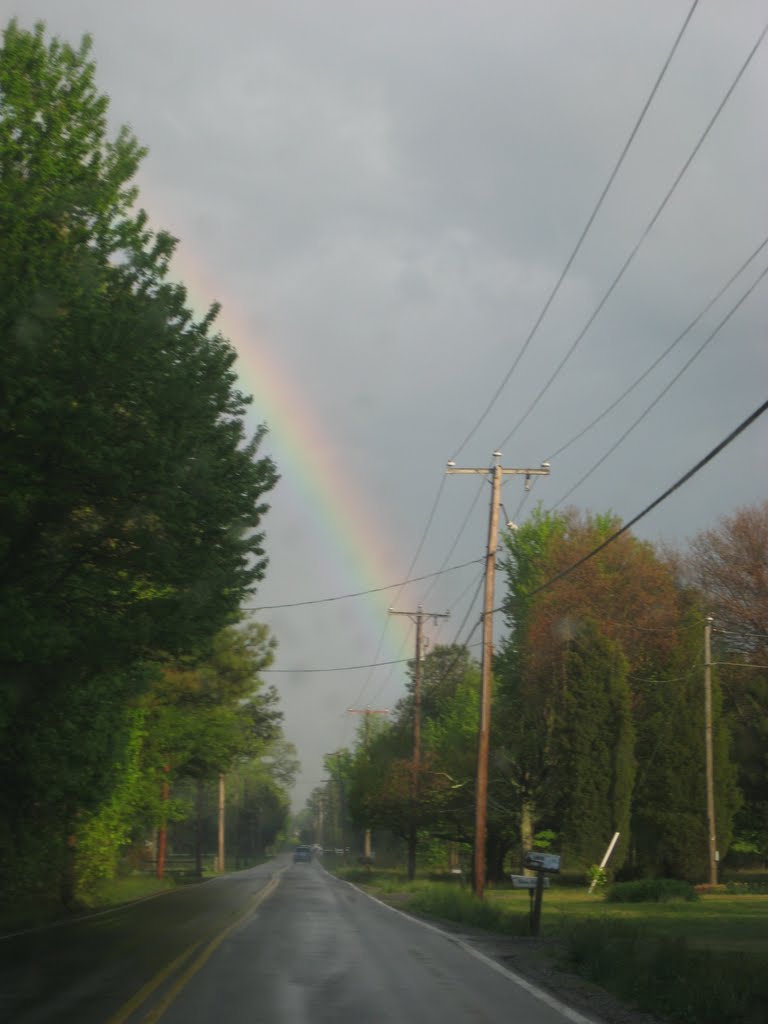 telephone wires and rainbow