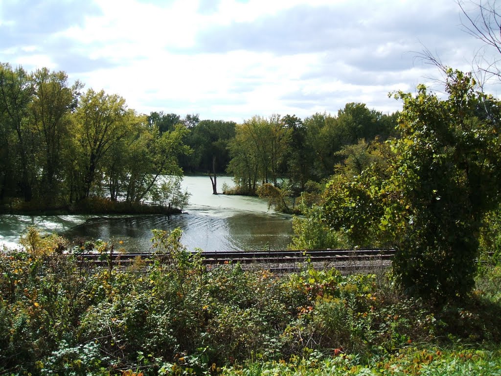 Railroad tracks by river