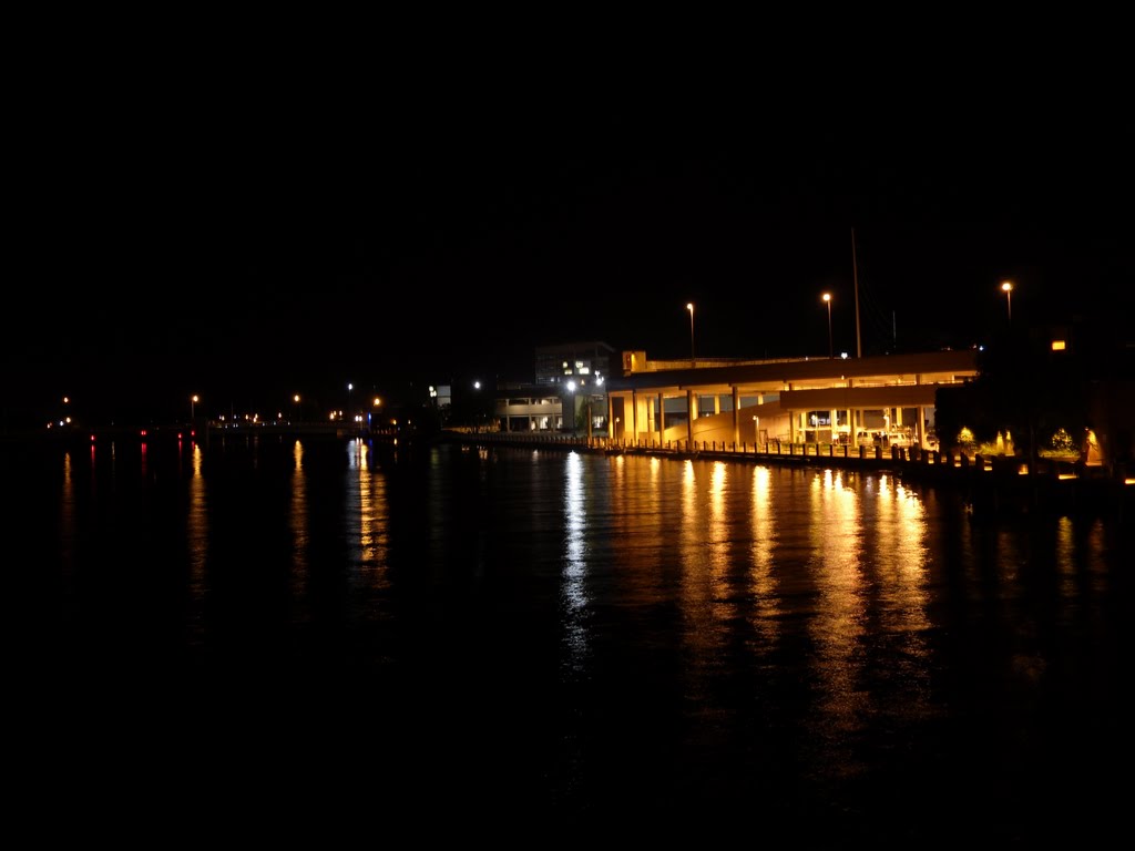 Oshkosh City Center at night from the Main St. Bridge