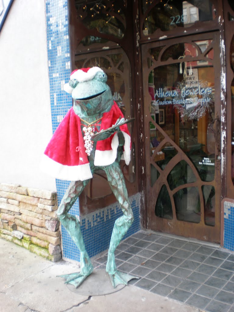 frog statue and art deco door