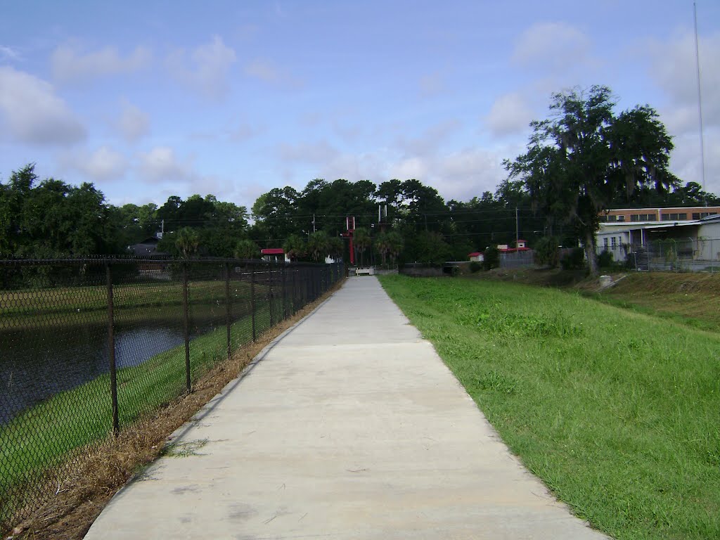 Azalea City Trail looking west along detention pond
