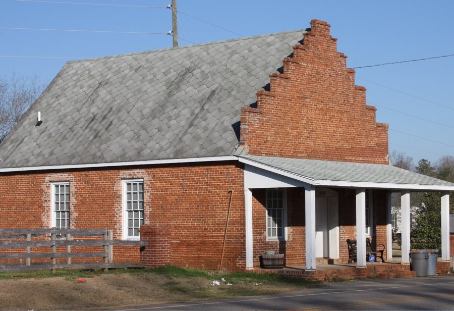 Goggans General Store, Goggans, Georgia.  Goggans was named for the family of John F. Goggans.  He donated the land for the railroad station, general store, where the post office was located, and access land to the Union Primitive Baptist Church.  At diff