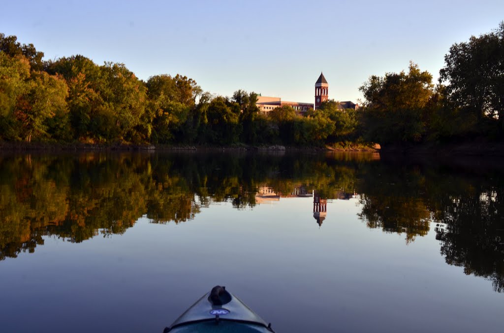 Romes old court house reflects in the distance on the Oostanaula River