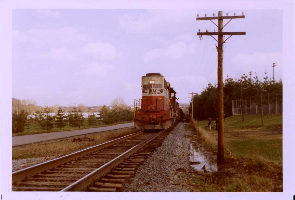 Coal train behind football field