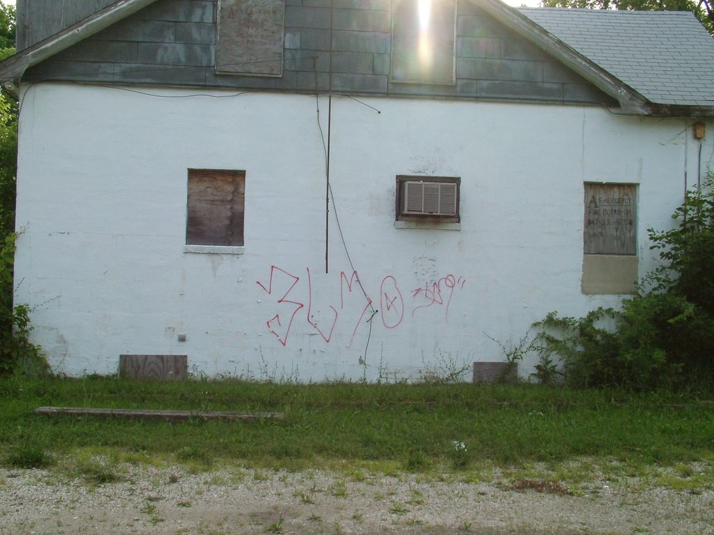 Gang signs on abandon house