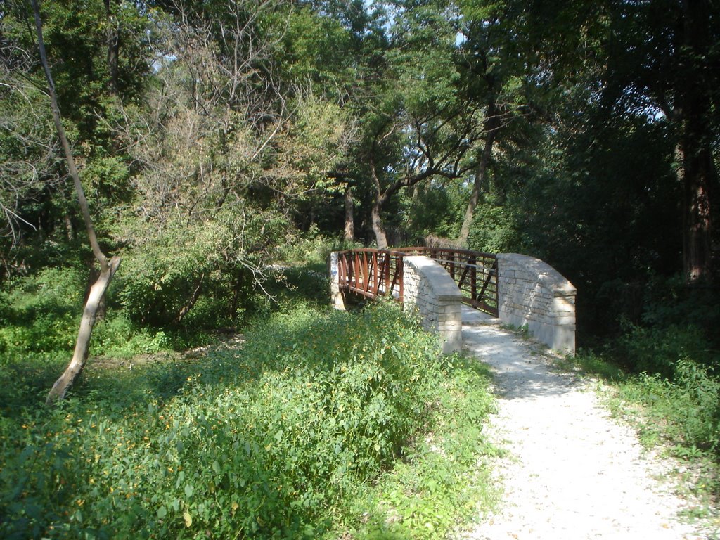 New bridge on gravel path near Portage site