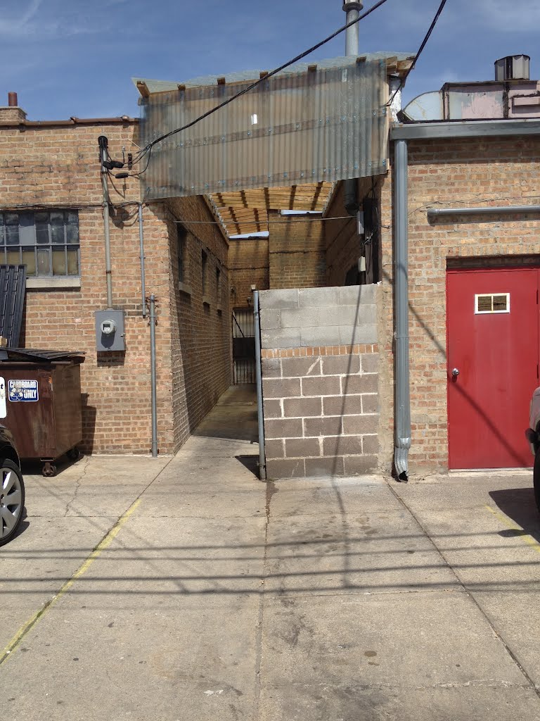 View of a  runned-down divider between buildings