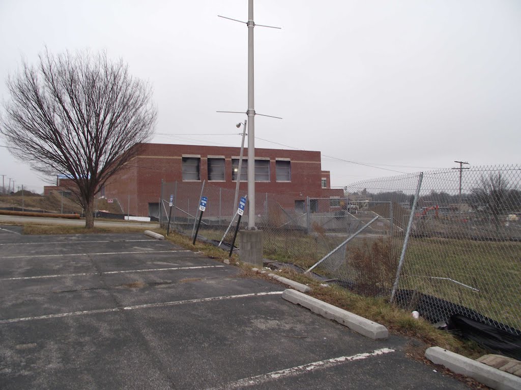 empty parking lot looking towards new pavillion