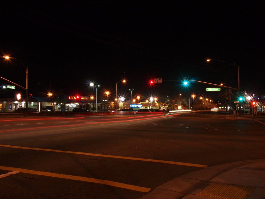 Intersection of Watt Ave. & Arden Way at night.
