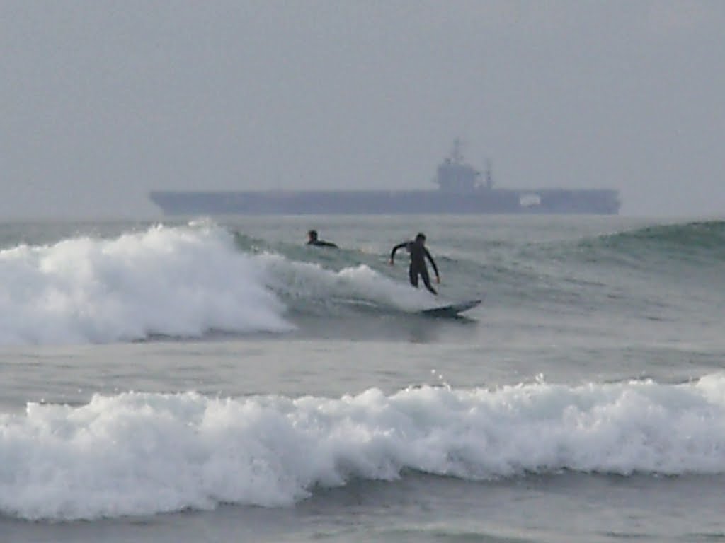Surfing in Imperial Beach, CA with Departing U.S. Aircraft Carrier