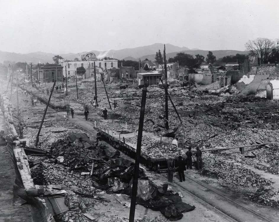 1906 - Flatbed cars on 4th St being loaded, source - Sonoma County Museum