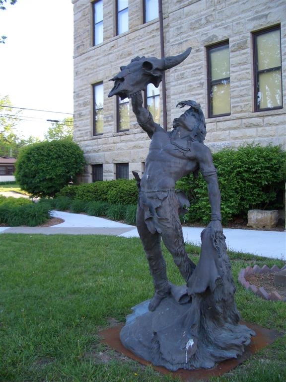 The Offering, Native American with cow skull and hide, life-size bronze, Junction City, KS