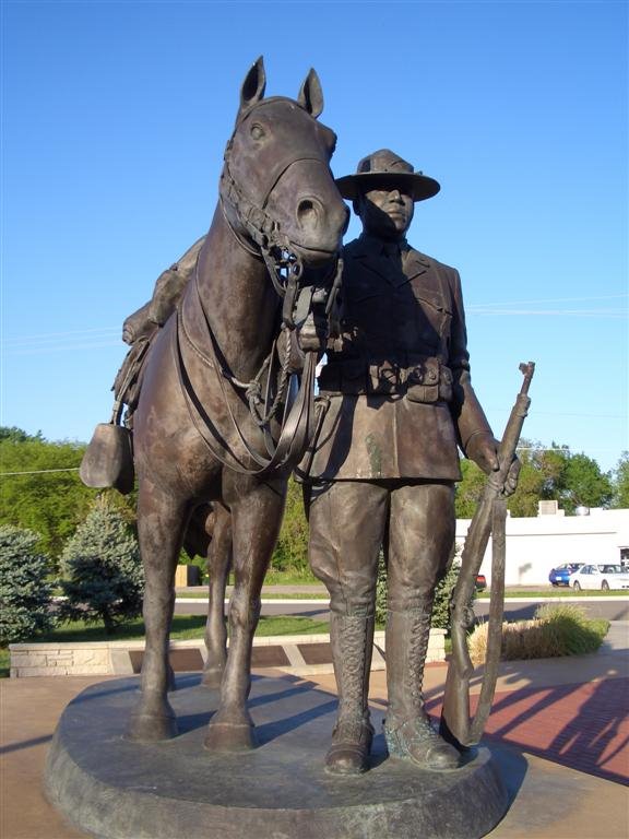WWI Trooper stands besides his mount, Buffalo Soldier Monument, Junction City, KS