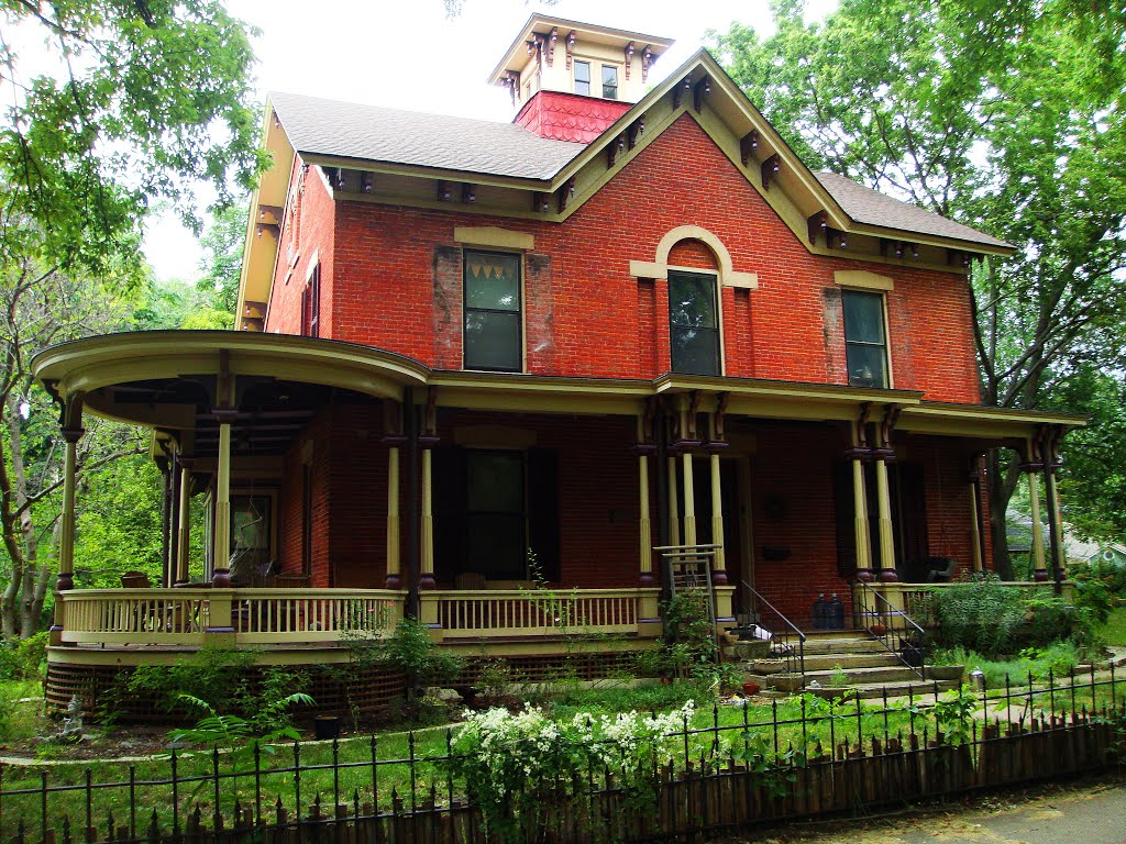 Italianate with wrap-around porch & cupola