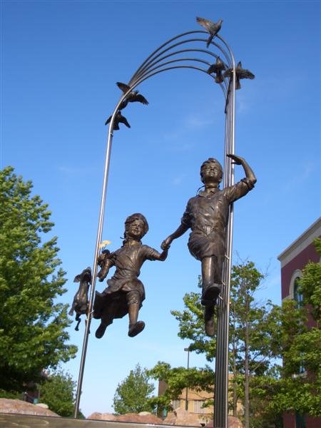 Children of the Trails, life-size bronze of boy, girl & dog, Olathe,KS