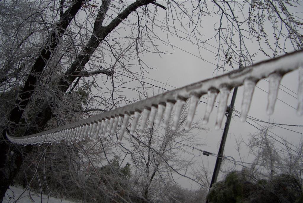 guide wire (not powered) during ice storm, Kansas City, KS