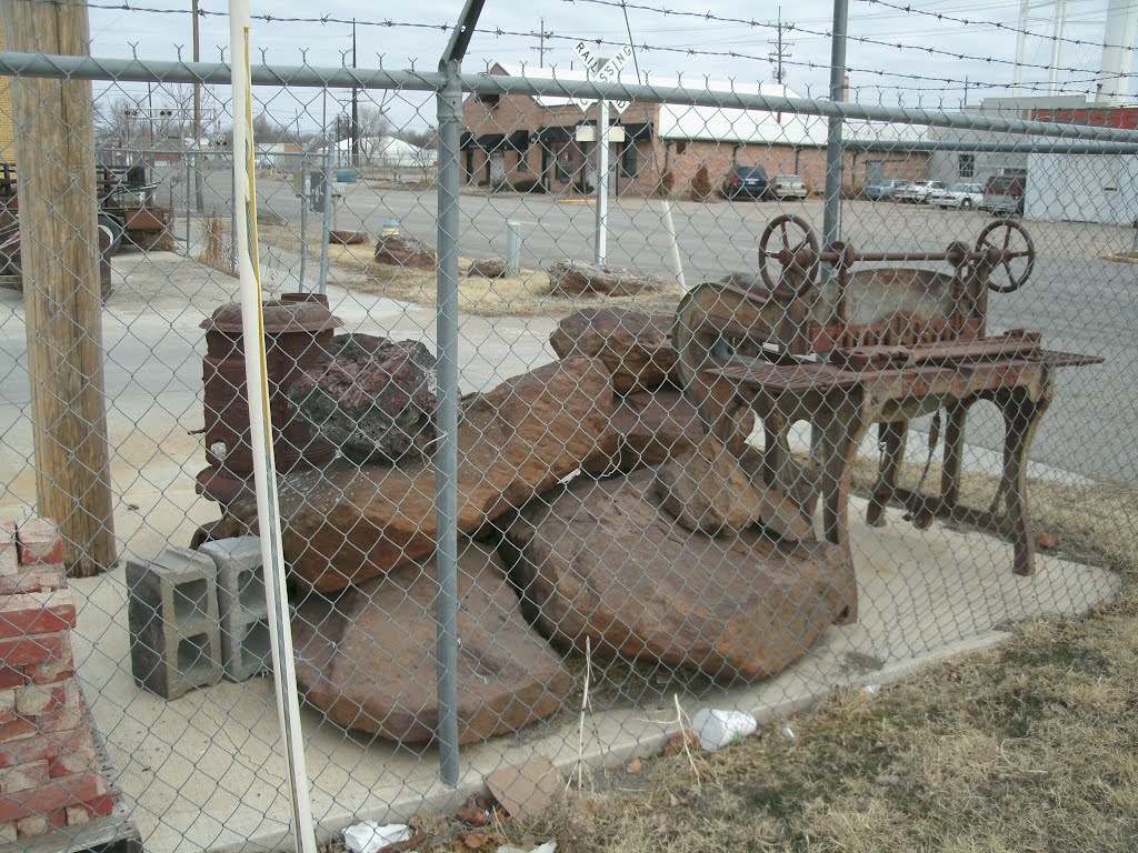Antique machinery and rocks, from the south west. Salina Kansas, January 12, 2012