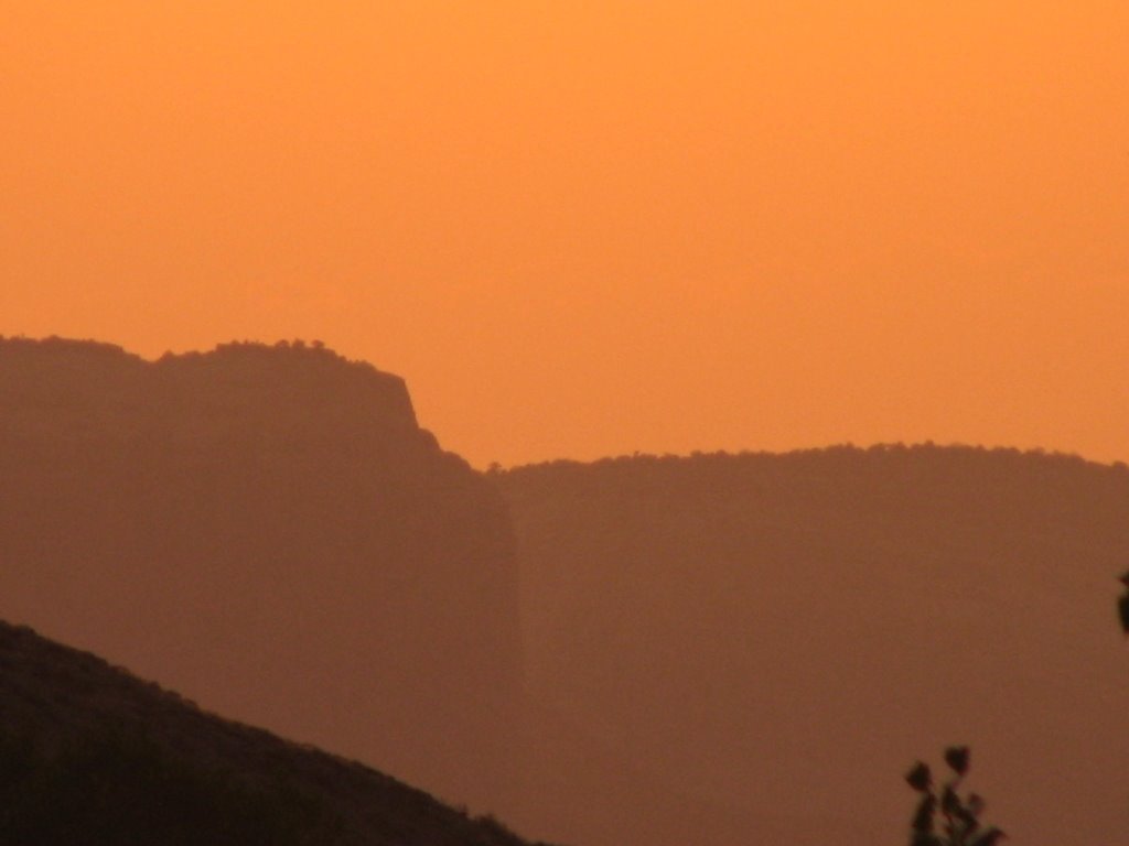 Utah fires make orange sunset over the Colorado National Monument