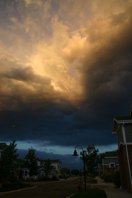 Clouds above our old house