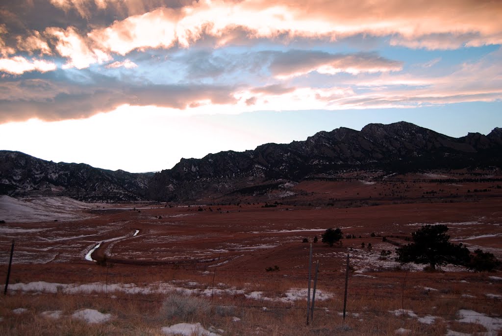 Sun setting behind the Rockies (Rocky Mountains), Boulder CO