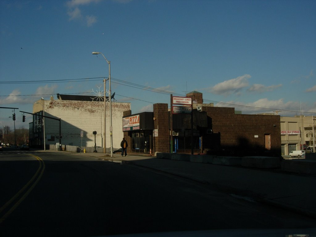 shadowy figure and pizza place