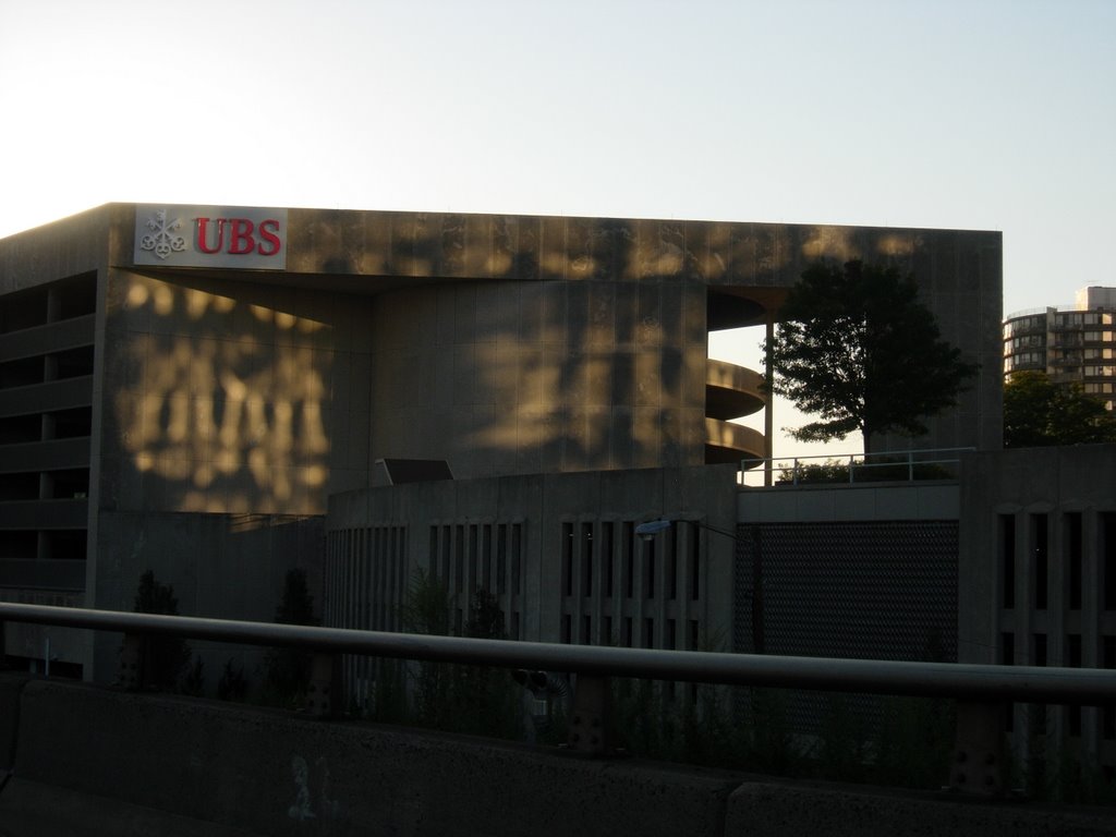 Swiss Bank, with light reflected from One Stamford Forum