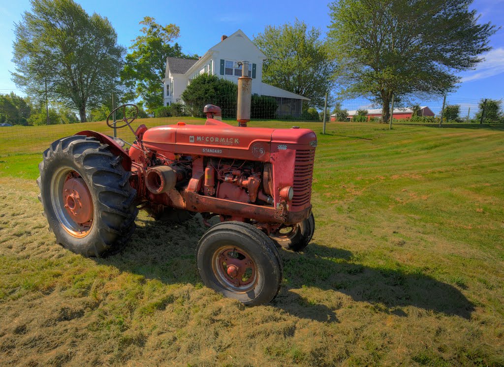 McCormick Tractor in Field in Front of Doe Orchards, Harvard, MA
