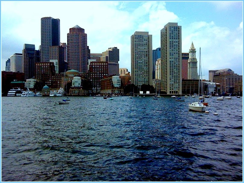 In VERTICAL...Modern Architecture and Construction...Boston view from the sea, with its skyscrapers.