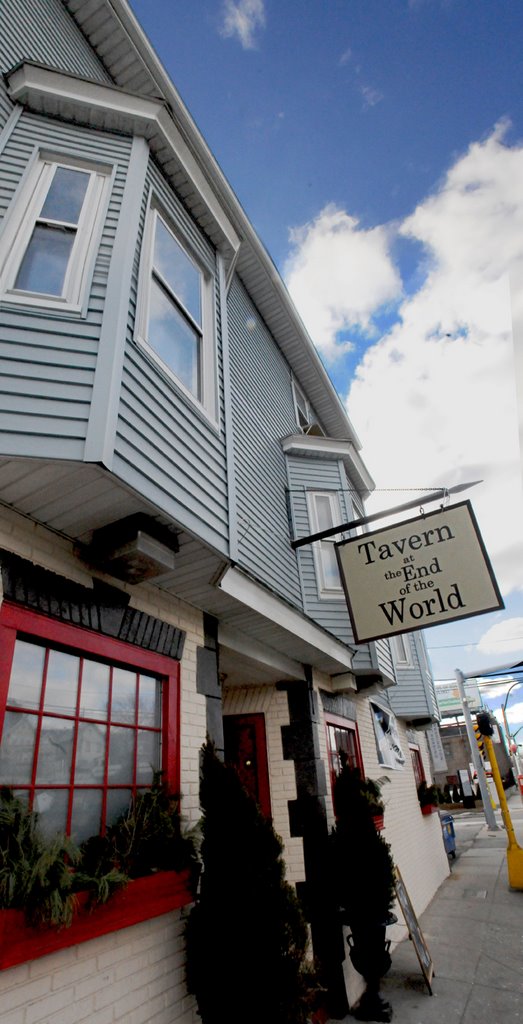 Tavern at the end of the world ; on the Boston / Cambridge line. This Pub replaced the town line in more ways than one. They have awesome food and wicked awesome beer! Finally a pub near the Sullivan sq T!