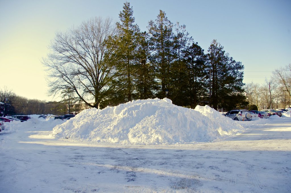 Snow pile near swimming pool.