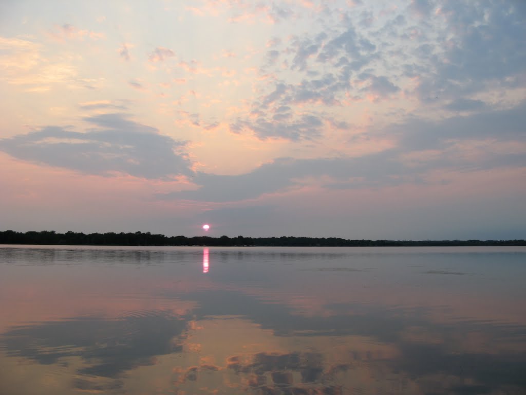 Aug 2007 - Plymouth, Minnesota. Pastel summer sunset reflecting on Medicine Lake.