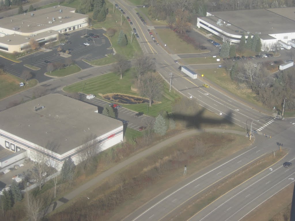 Shadow of plane coming into MSP Nov 2013