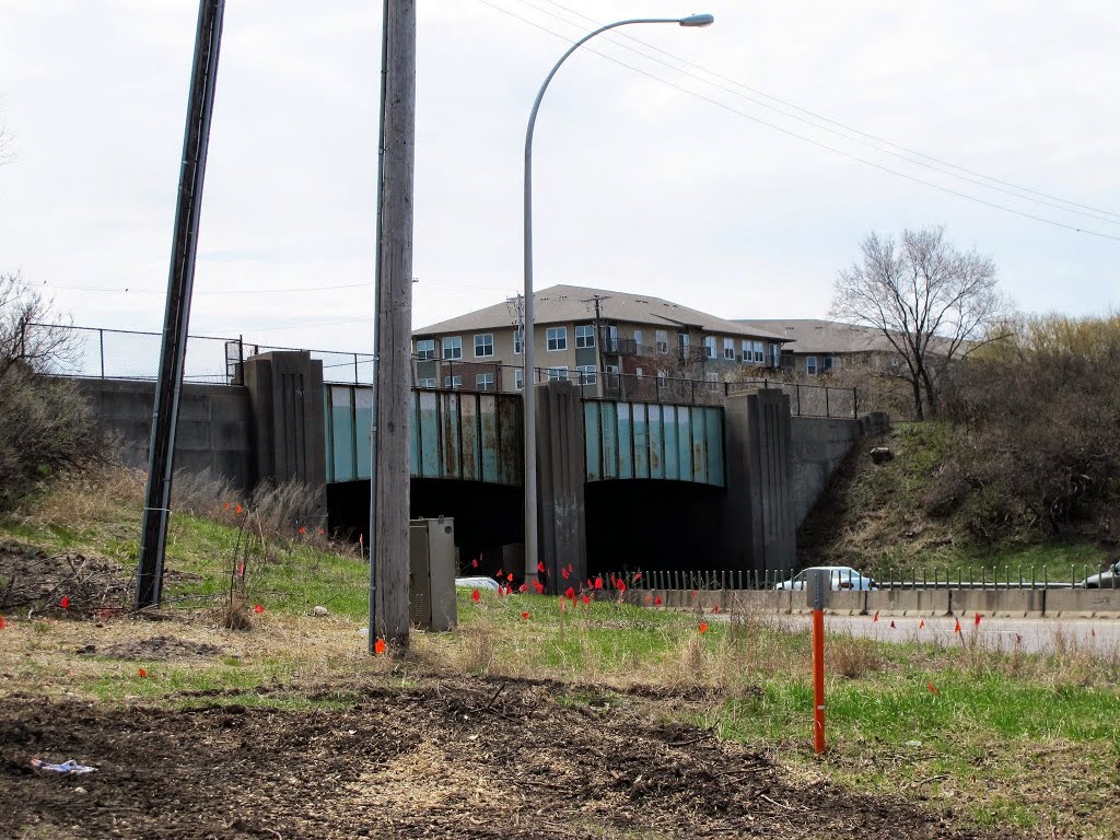 Historic Bridge 5309 (old Soo Line RR overpass), looking southwest from Lilac Park across Hwy 100.