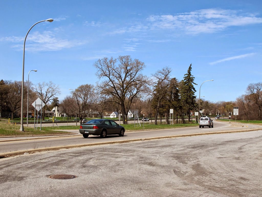 Entrance ramps connecting Minnetonka Blvd and northbound Highway 100, looking northwest.  These ramps were built in the late 1960s through what was the original Lilac Park built in the late 1930s.