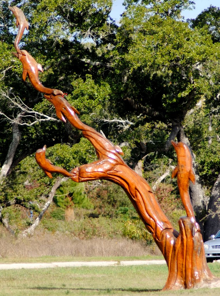 Tree carving on the beach in Long Beach, Mississippi