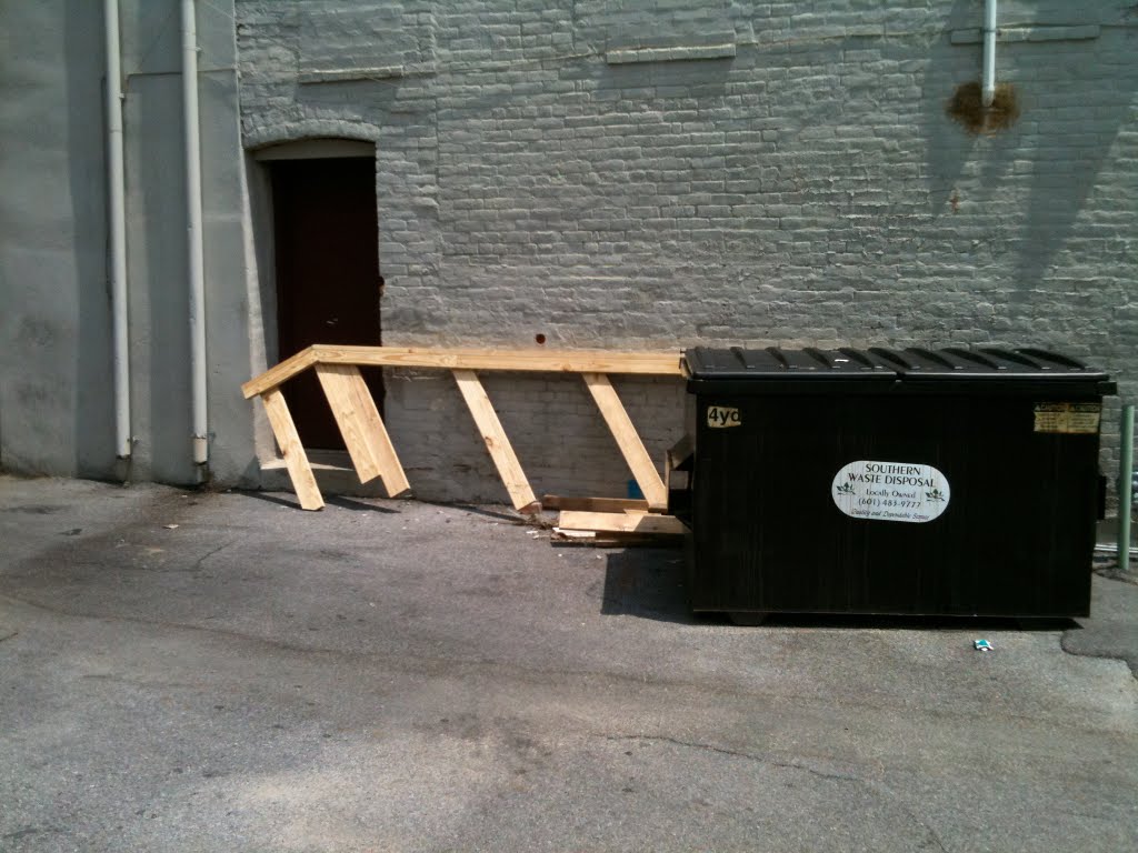 Trash behind Wrangler