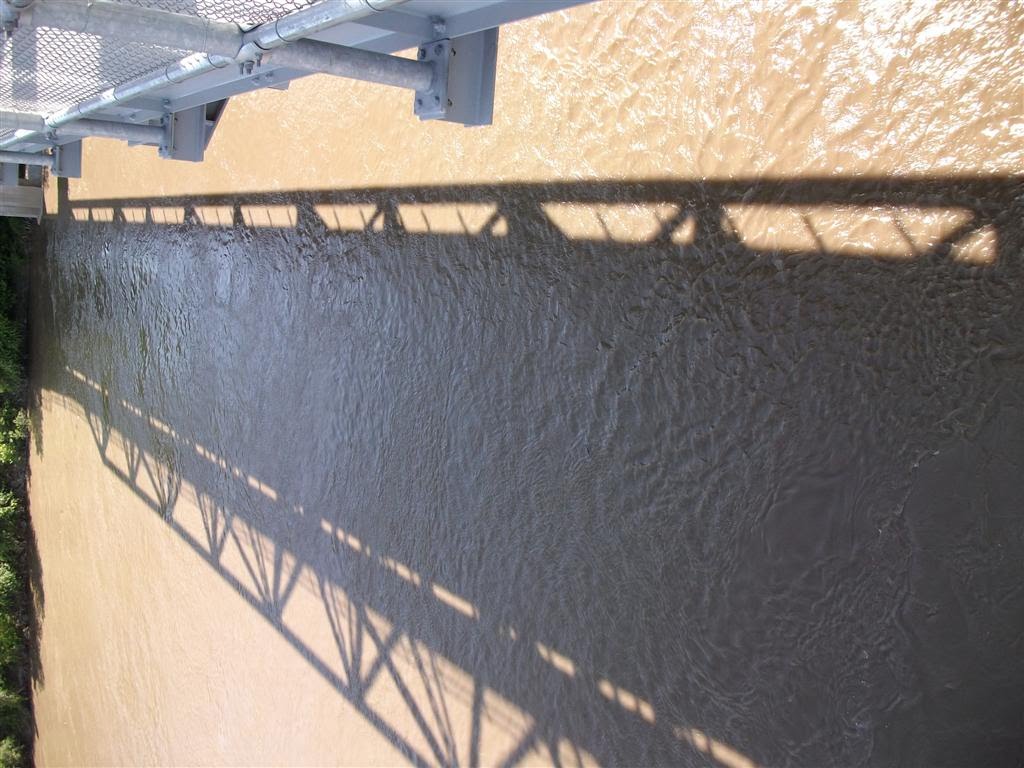 bridge shadows in the Missouri River south of viewing platform, Jefferson City, MO