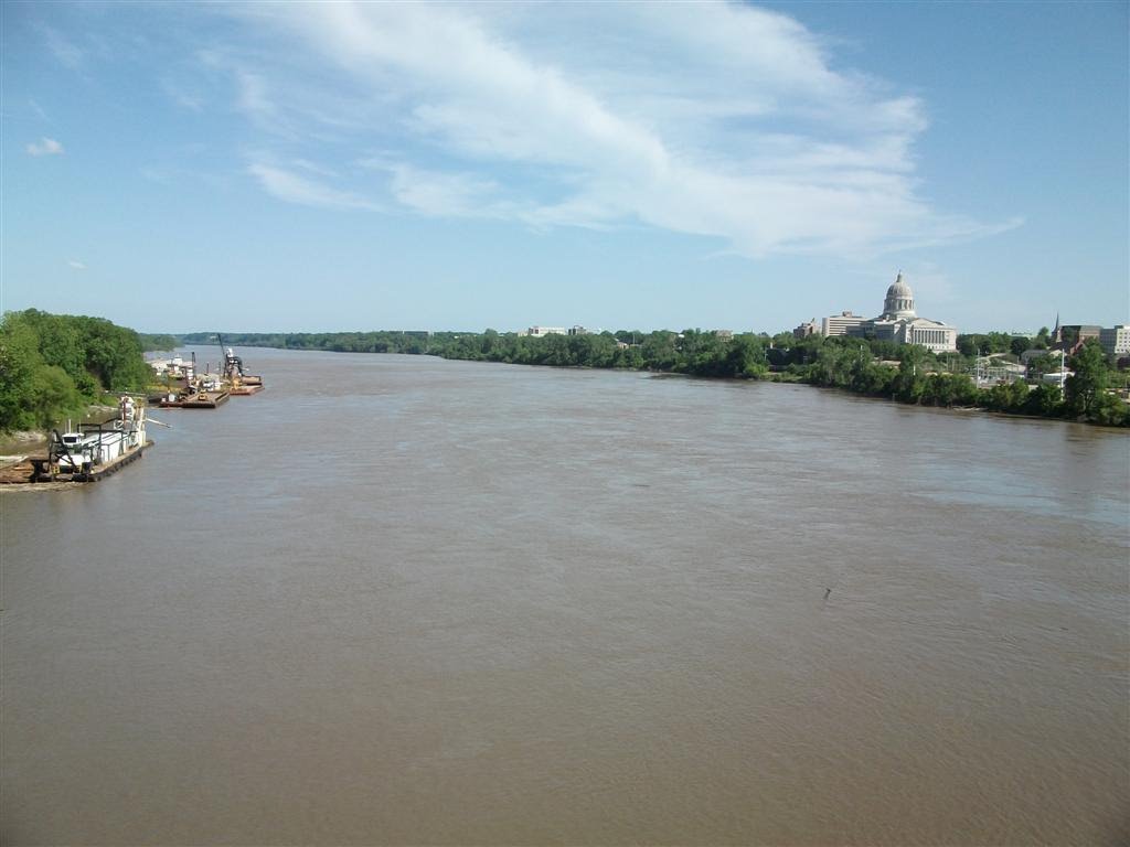 looking down the Missouri River, Muddy MO, from pedestrian walkway, barges on the left, capitol on the right, Jefferson City, MO