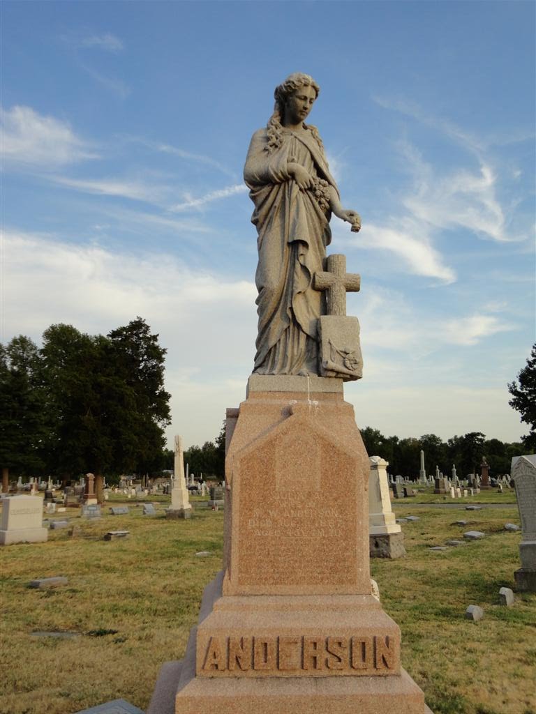 Woman atop gravestone, life-size, Woodlawn Cemetery, Independence, MO
