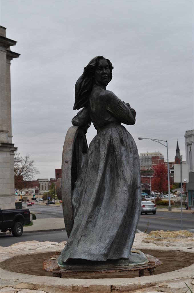 NoTurning Back, bronze statue of girl and wagon wheel, St Joseph, MO