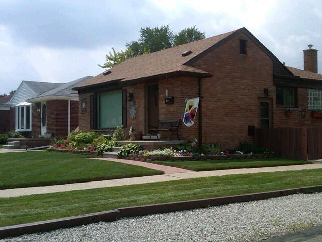 Brick Front Porch and Owens Corning Roof Garden City Michigan