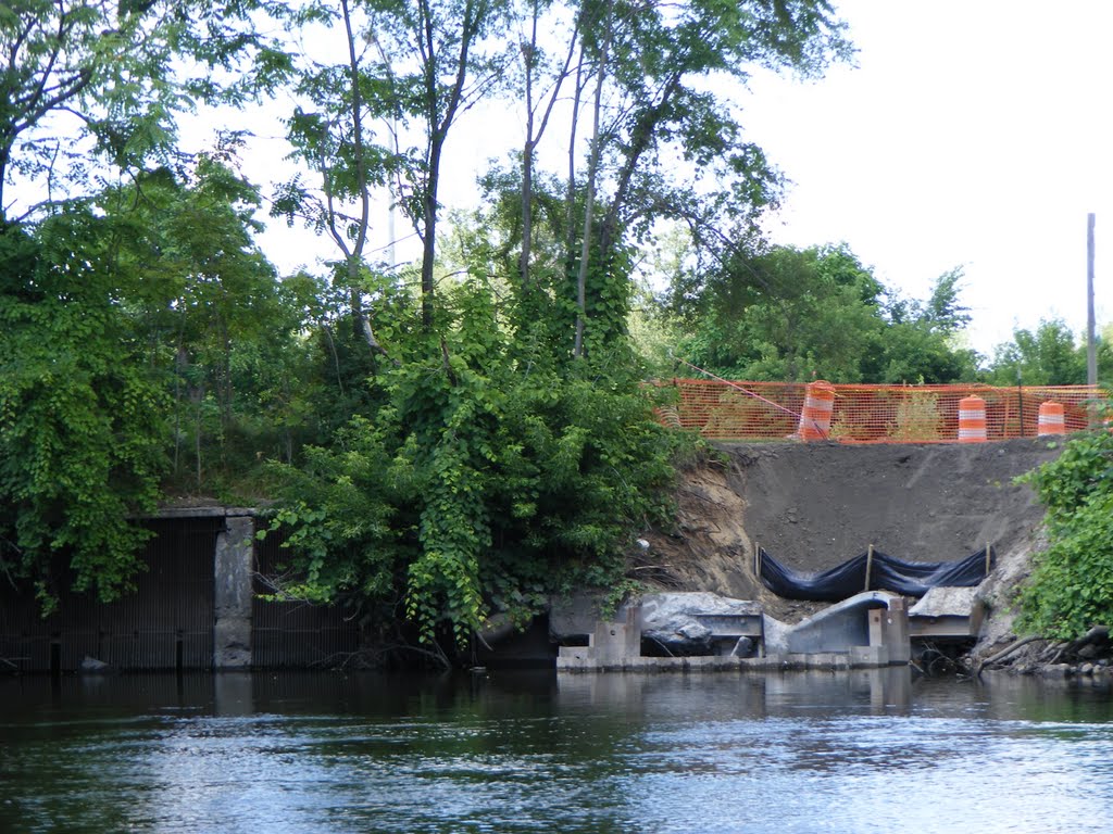 Digging for new pipes for Construction on Railroad Viaduct Underpass on M-43 in Kalamazoo, MI