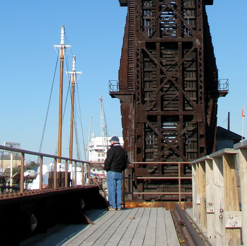 The captain Richi on harbor patrol at the old railroad bridge.