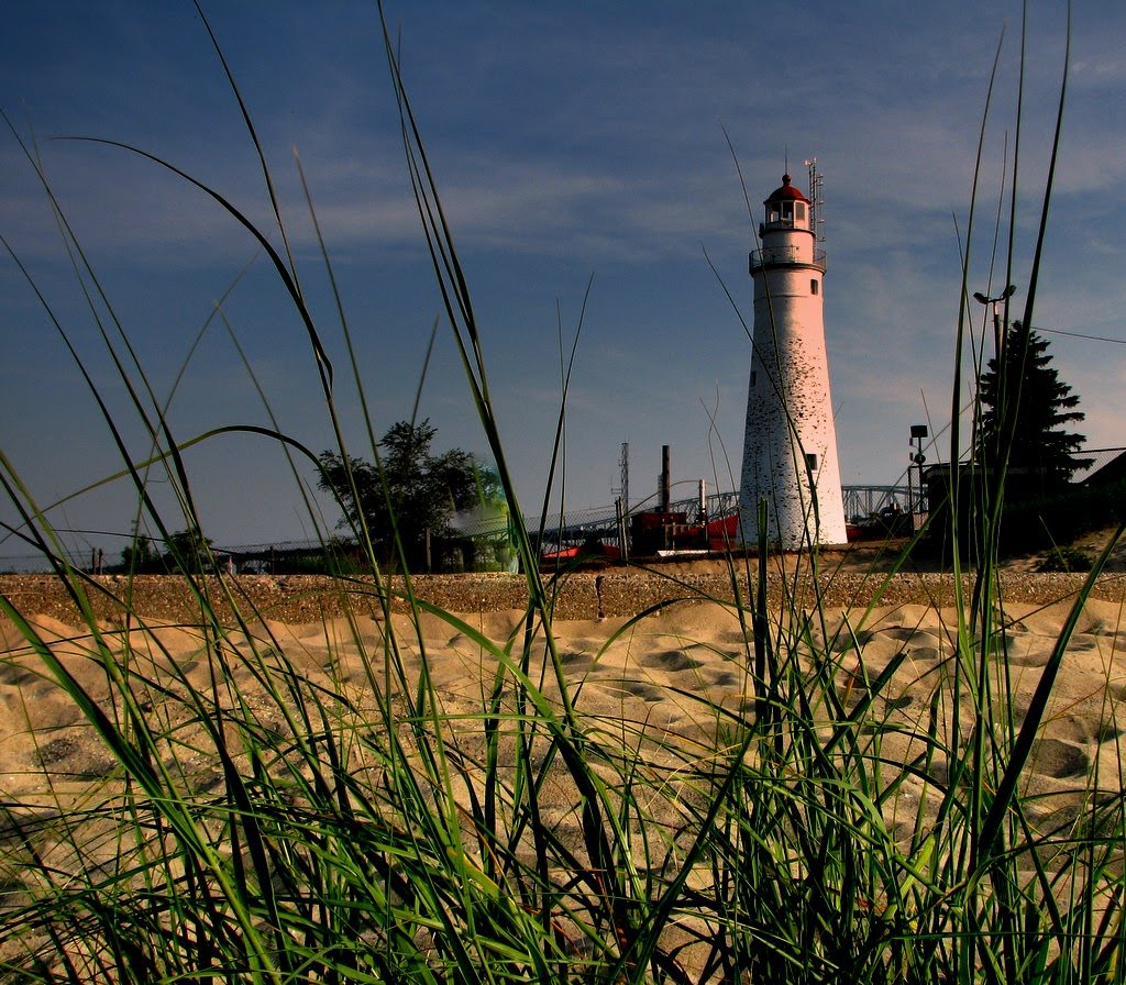 Fort Gratiot Lighthouse with Blue Water Bridge in background