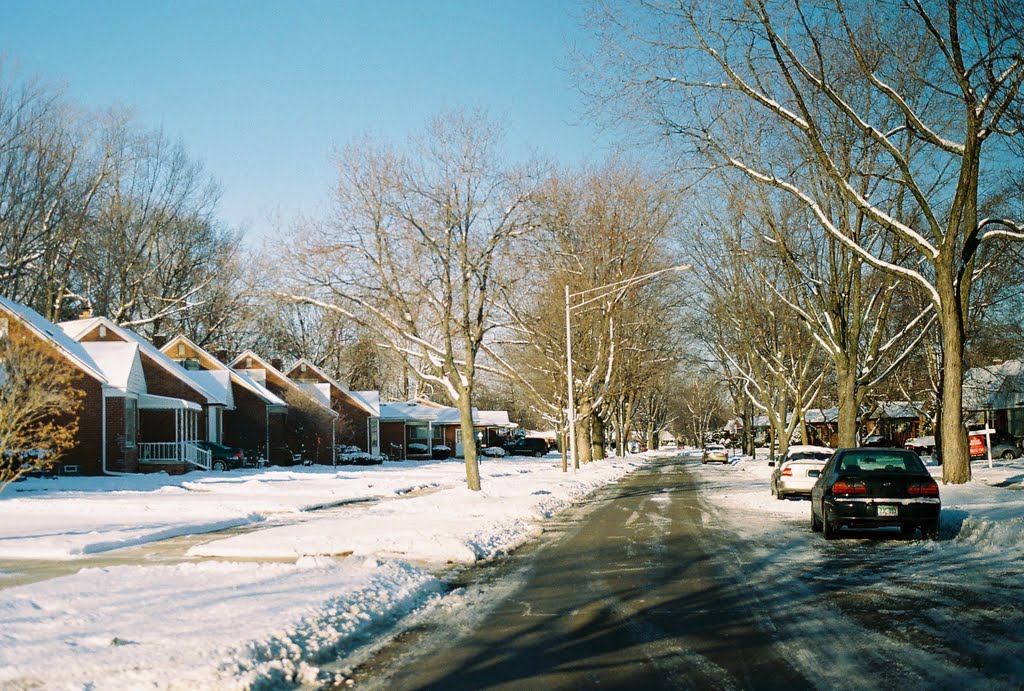 Snowy street in Detroit suburb of Harper Woods Michigan USA