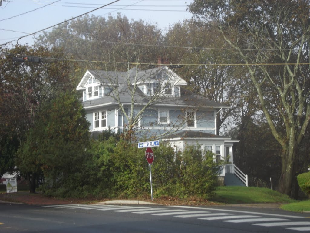 Gray house on the corner.