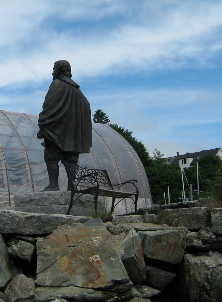 Caped statue at the docks