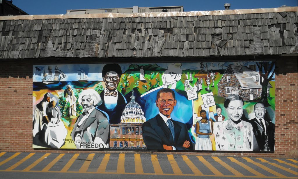 racial mural and decrepit roof