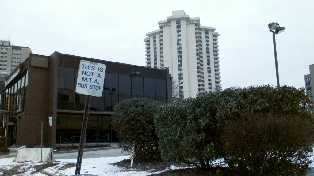 Vacant building, discontinued bus stop