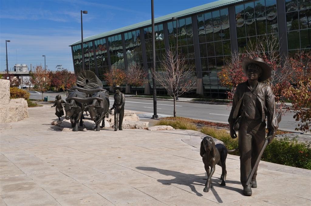 a boy and his dog, Pioneer Courage, Omaha, NE